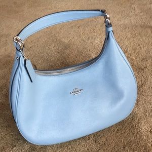 Coach purse in light blue.